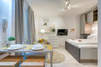 Posteľ alebo postele v izbe v ubytovaní Riverside Deluxe Apartment