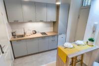 Kuchyňa alebo kuchynka v ubytovaní Riverside Deluxe Apartment