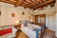 A bed or beds in a room at Agriturismo Malagronda