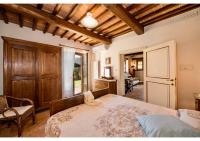 A bed or beds in a room at Agriturismo Malagronda
