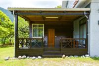 a front porch of a house with a door at Taroko Sialin Coffee Farm Homestay in Xiulin