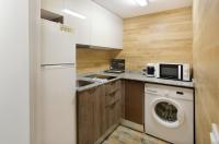 Kuchyň nebo kuchyňský kout v ubytování Santa Clara Apartments