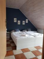 Postel nebo postele na pokoji v ubytování Niewinne domki - Alentejo