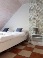 Postel nebo postele na pokoji v ubytování Niewinne domki - Alentejo