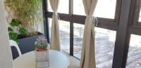 En balkon eller terrasse p&aring; Le Particulier - Appart Hotel