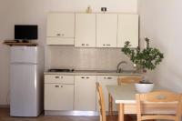 A kitchen or kitchenette at Residence e B&B La Cappella Del Convento