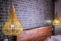 Postel nebo postele na pokoji v ubytování Moscha Hotel