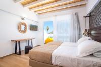 Postel nebo postele na pokoji v ubytování Moscha Hotel