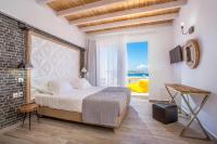 Postel nebo postele na pokoji v ubytování Moscha Hotel