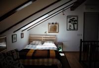 Una cama o camas en una habitaci&oacute;n de Apartments Livun Tuheljske Toplice