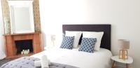 En eller flere senge i et v&aelig;relse p&aring; Le Particulier - Appart Hotel