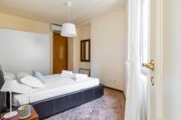 Posteľ alebo postele v izbe v ubytovaní LE RONDINELLE Apartment Bellagio