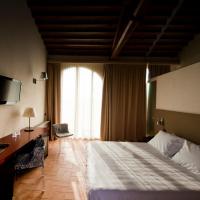 Łóżko lub łóżka w pokoju w obiekcie Locanda Sant'Agata