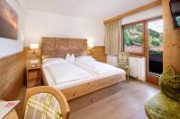 Posteľ alebo postele v izbe v ubytovaní Hotel Platzl