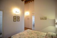 A bed or beds in a room at Agriturismo La Fonte