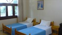 A bed or beds in a room at Villa Iris