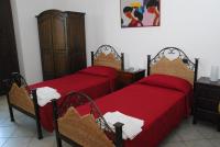 Łóżko lub łóżka w pokoju w obiekcie B&B Martius 2