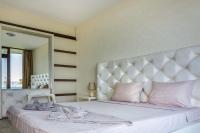 Postel nebo postele na pokoji v ubytování Apartcomplex Golden Bay