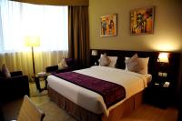 V Hotel Fujairahにあるベッド