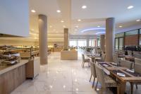 Poseidon Hotel Sea Resortにあるレストランまたは飲食店
