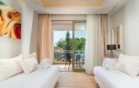 Poseidon Hotel Sea Resortにあるベッド
