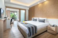 Poseidon Hotel Sea Resortにあるベッド