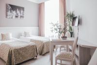 Postel nebo postele na pokoji v ubytování Apartamenty Bonerowska 5