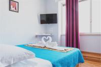 A bed or beds in a room at Ciclamino Siracusa