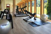 Posilňovňa alebo fitness centrum v ubytovaní Tevini Dolomites Charming Hotel