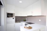 Kuchyň nebo kuchyňský kout v ubytování 137 LuxResidence