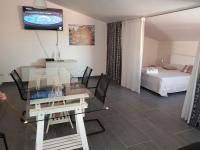 A bed or beds in a room at Lilium In B&B