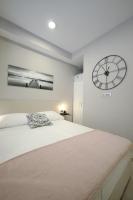 Posteľ alebo postele v izbe v ubytovaní Teatro Verdi Accommodation