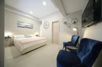 Televízia a/alebo spoločenská miestnosť v ubytovaní Teatro Verdi Accommodation