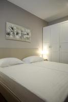 Posteľ alebo postele v izbe v ubytovaní Teatro Verdi Accommodation