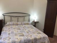 Posteľ alebo postele v izbe v ubytovaní Lovely Apartments Barra di ferro centro Storico Cuneo