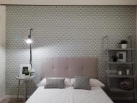 Postel nebo postele na pokoji v ubytování Vestal Suites Classic