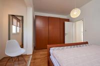 Posteľ alebo postele v izbe v ubytovaní Apartmani Sara i Klara