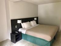 Hotel Bosque de Reñacaにあるベッド