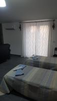 A bed or beds in a room at Lilium In B&B