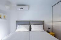 Posteľ alebo postele v izbe v ubytovaní Villa Del Sol Mykonos