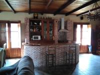 Una televisión o centro de entretenimiento en Estudio Rustico