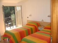 A bed or beds in a room at Residence e B&B La Cappella Del Convento
