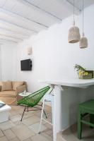 Televízia a/alebo spoločenská miestnosť v ubytovaní Villa Del Sol Mykonos