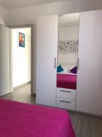 Postel nebo postele na pokoji v ubytování Apartments J&K