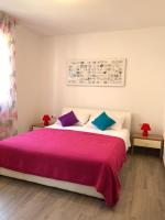 Postel nebo postele na pokoji v ubytování Apartments J&K