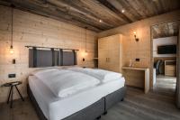 A bed or beds in a room at Vila Altonn