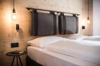 A bed or beds in a room at Vila Altonn