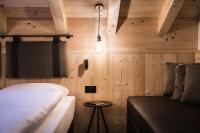 A bed or beds in a room at Vila Altonn