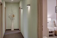 a hallway with a vase of flowers in a room at Hotel Florenc in Prague