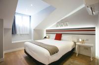 Posteľ alebo postele v izbe v ubytovaní Legazpi Doce Rooms & Suites